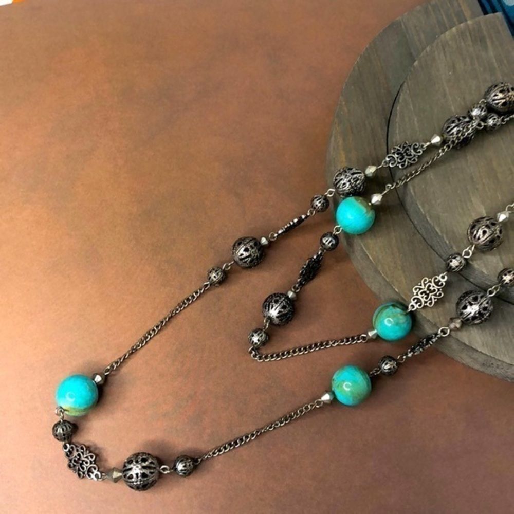 Vintage long necklace with blue beads and silver filigree